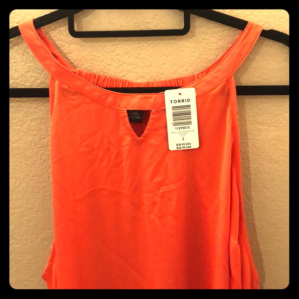 Torrid chiffon orange halter top. Never worn.